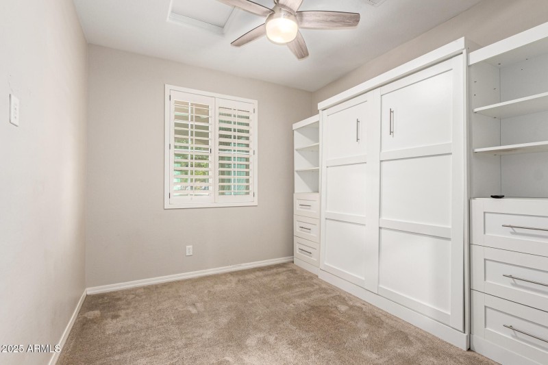 Downstairs bedroom w: wall bed