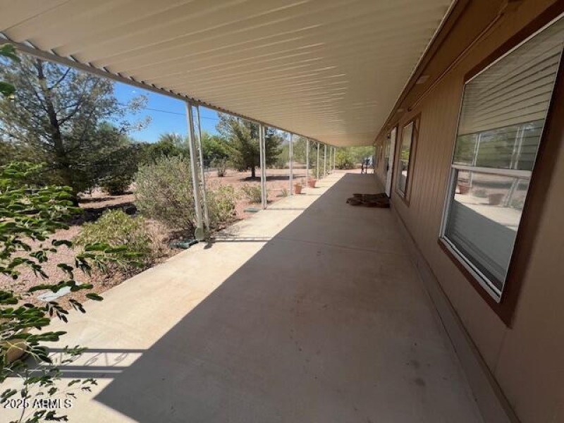 West side porch by front door