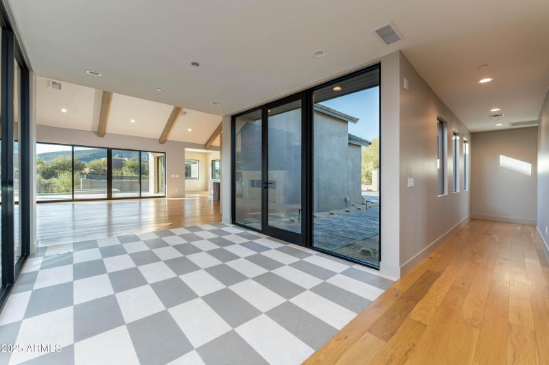 Front entry and hallway to guestrooms