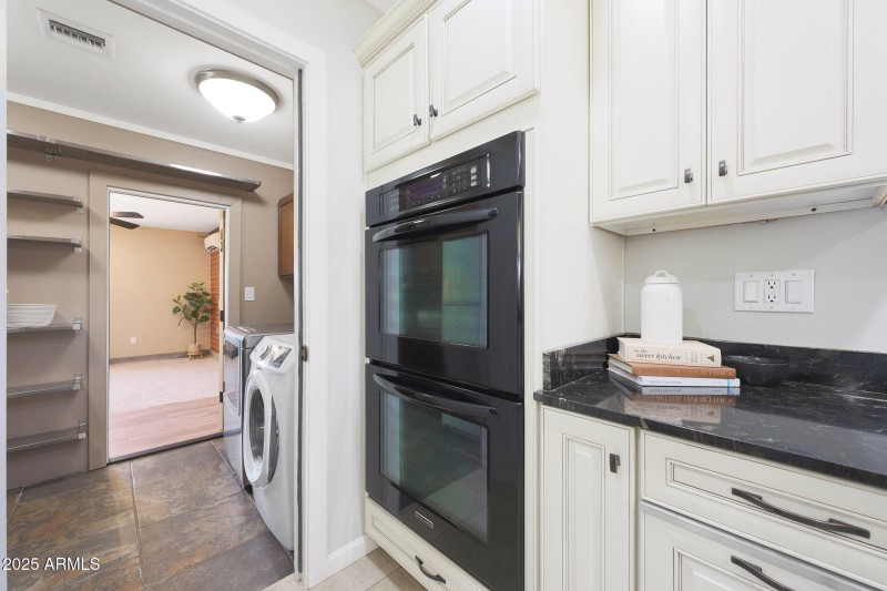 Kitchen leading into Lndry/Pantry