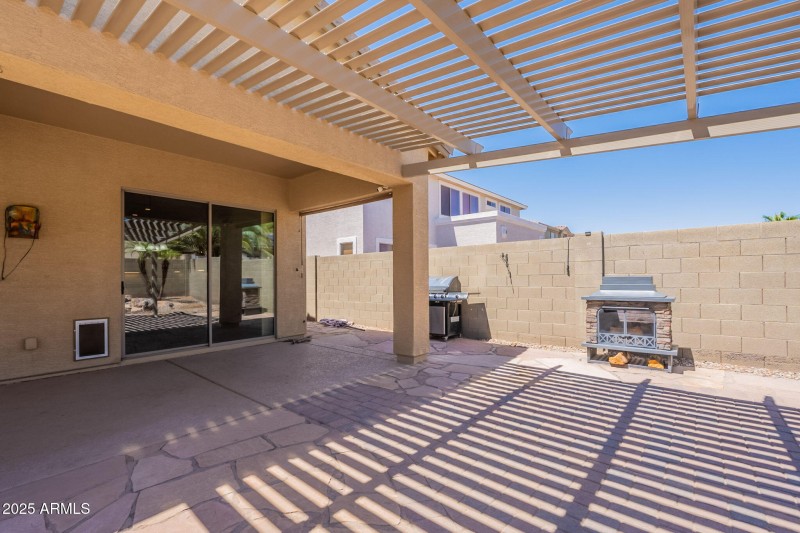 Pergala with outdoor Fireplace