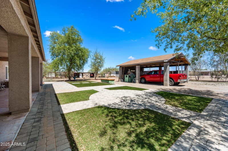 Synthetic grass and pavers