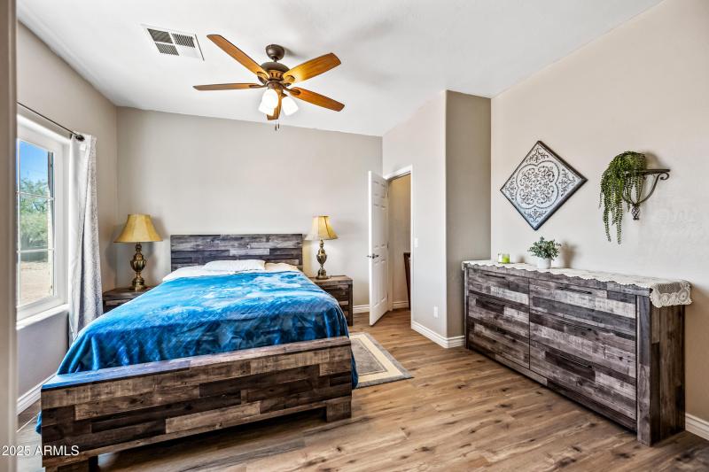 Primary bedroom walk in closet