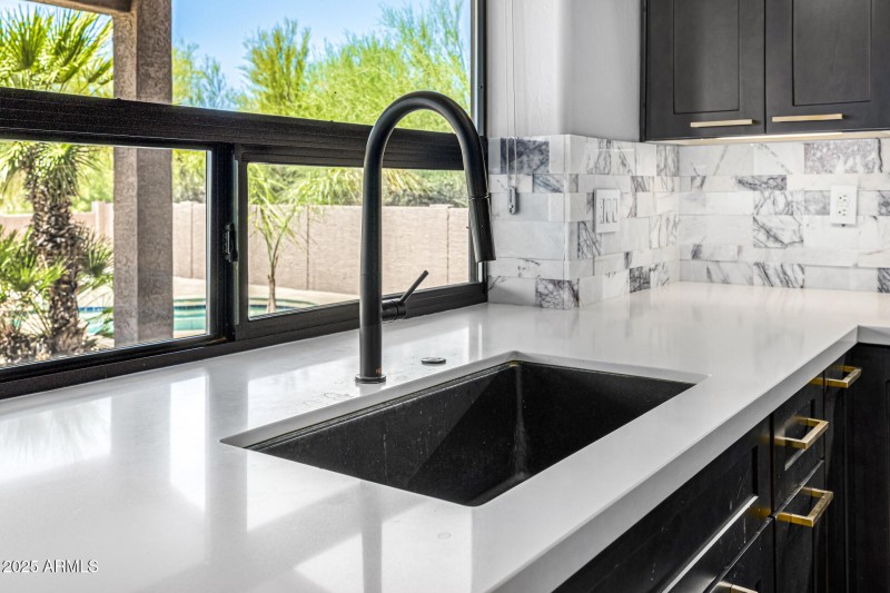 Kitchen Sink with Pool Views
