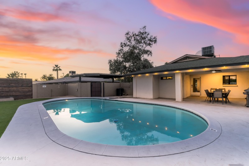 Pool featuring a side entry gate