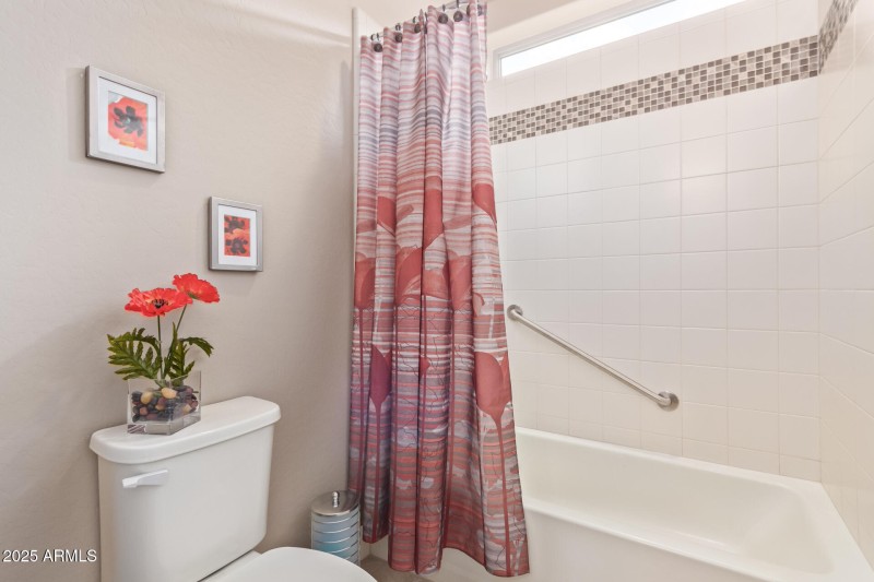 Jack 'n Jill tiled shower over tub