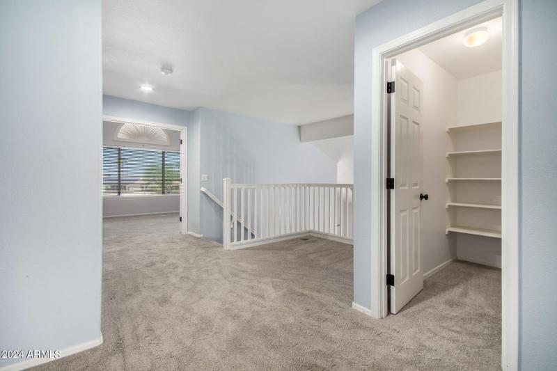 Upstairs loft area with view of Linen-St
