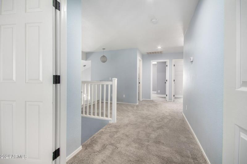 Upstairs Loft area - view to Bedrooms 3