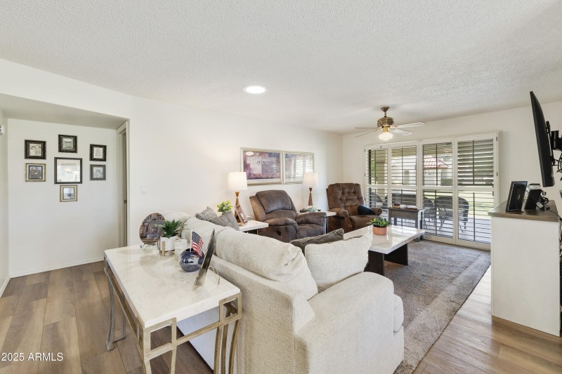 Spacious living and wood flooring