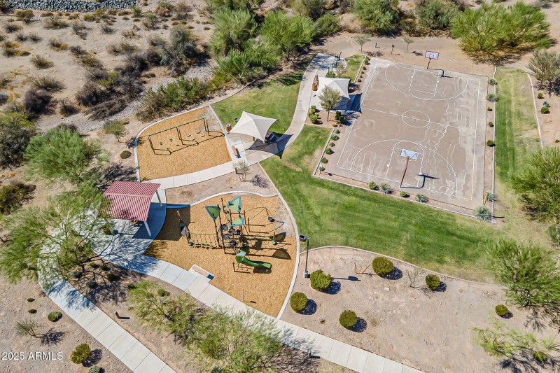 Basketball court, swings.