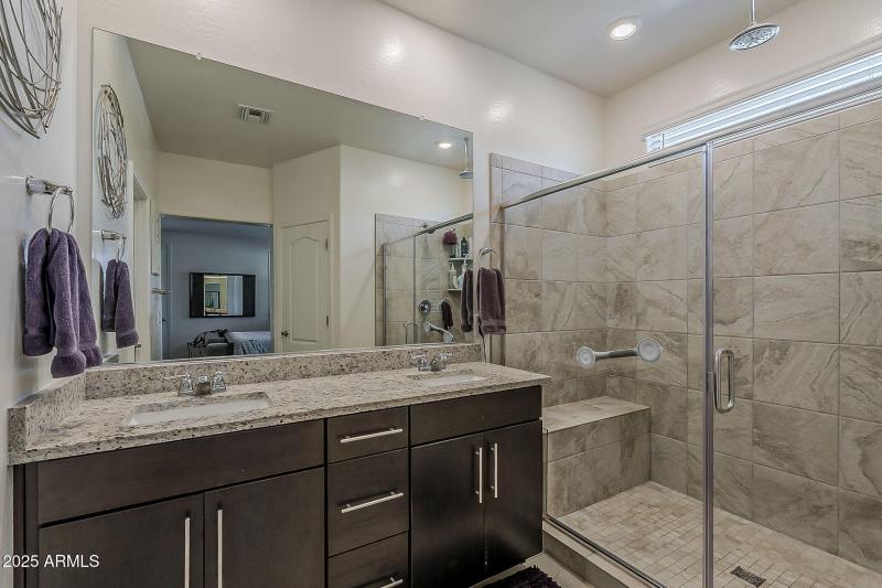 Primary bathroom with double sinks.