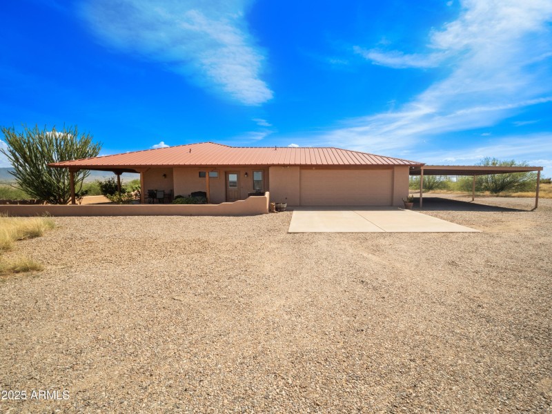 2 Car Garage + 2 Car Covered Parking