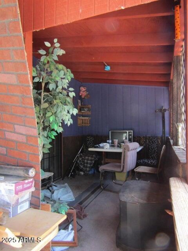 Partially enclosed back porch