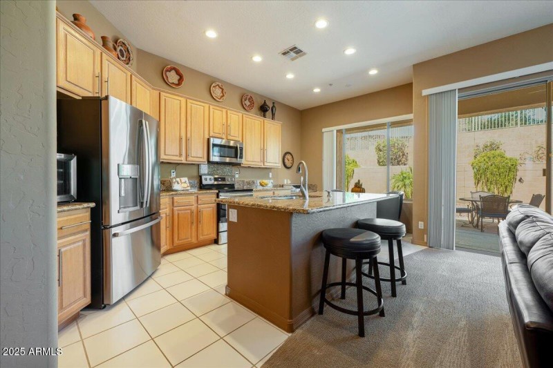 Center Island Kitchen Has SS Appliances