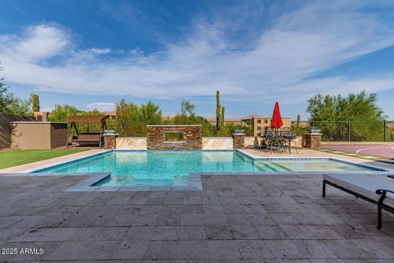 Pool with Water Feature and Fireplace