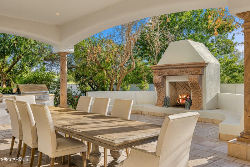 73outdoor dining and fireplace lounge