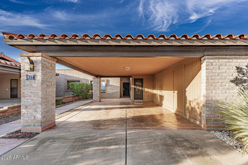 FRONT OF HOME; STORAGE ON CARPORT