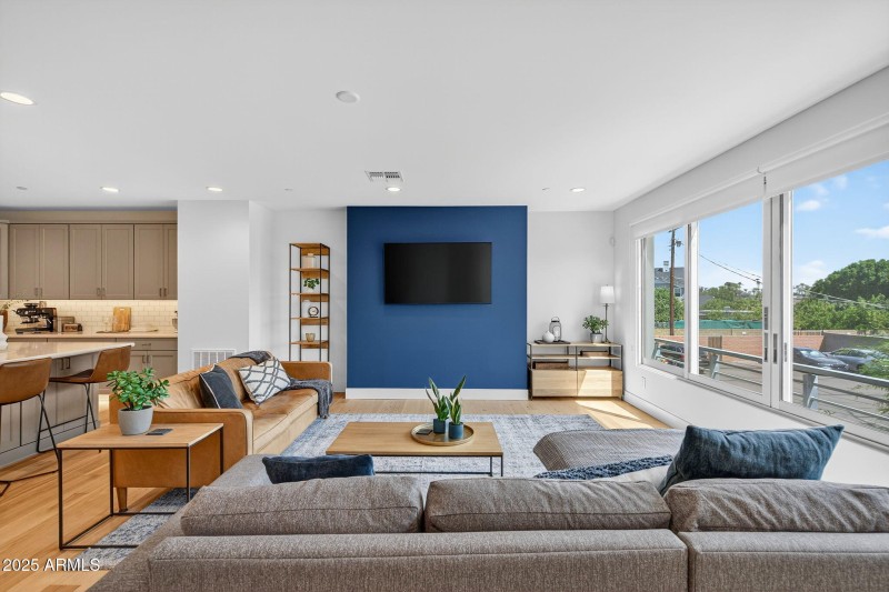 Enjoy Natural Light from Wall of Windows