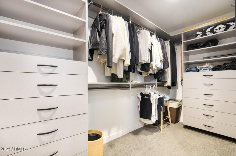 Custom closet with lots of storage.