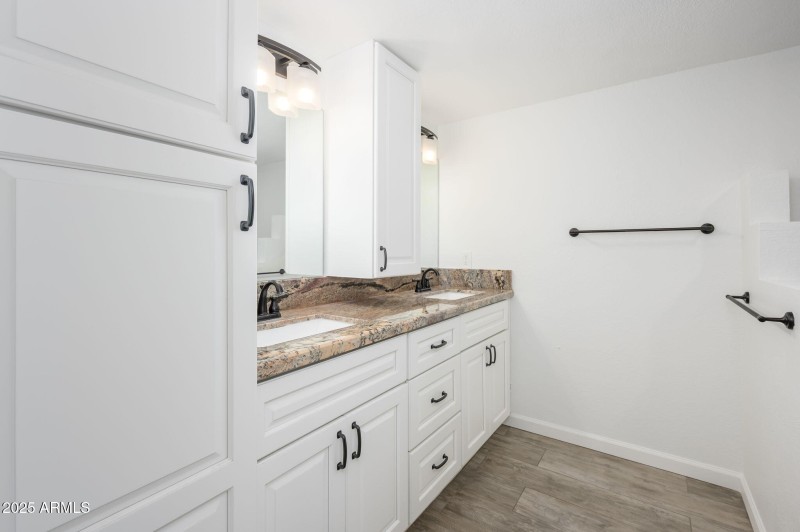 Remodeled bathroom with dual sinks