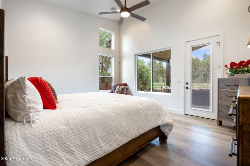Master bedroom outlooking private pond