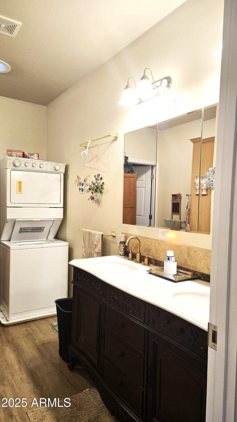 primary Bath 2 sinks sTacked washer drye