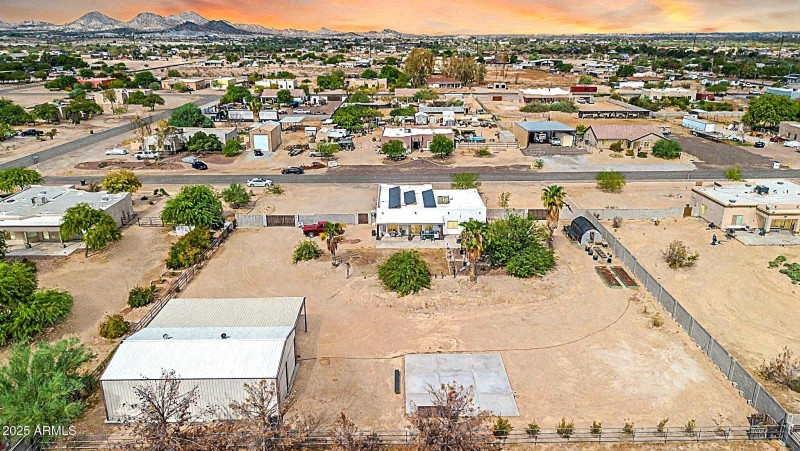 Outbuilding +Main Home Backyard View