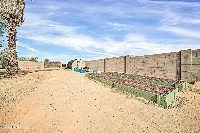 Greenhouse +Raised Garden Beds Distant