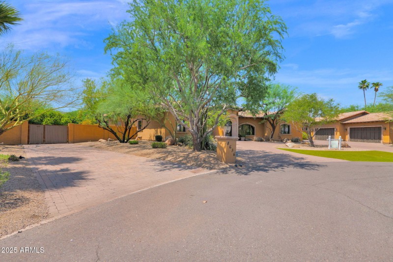 extra driveway to back side yard w/ gate