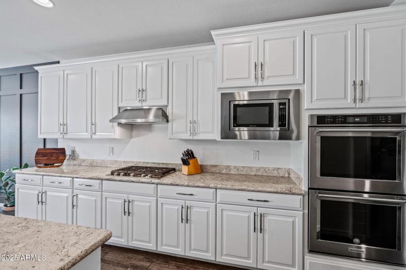 White cabinets with nickle handles