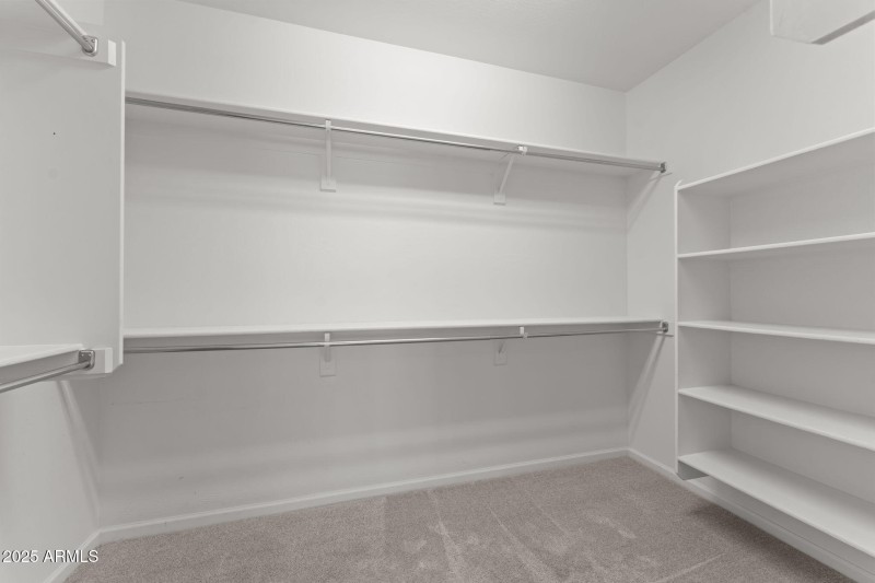 Primary walk-in closet