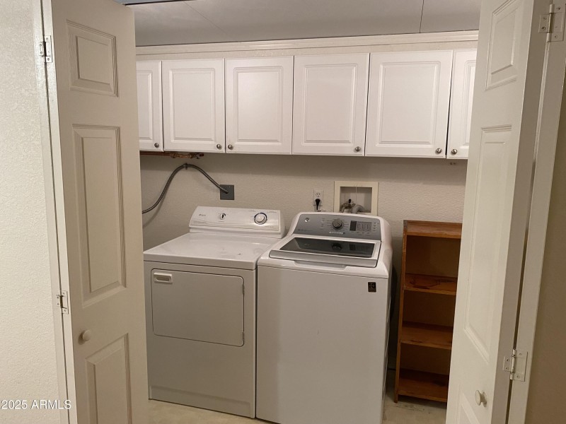 Full Laundry with Built In Cabinets