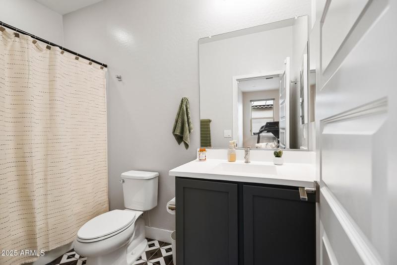 BATHROOM IN DEN OR GUEST QUARTERS