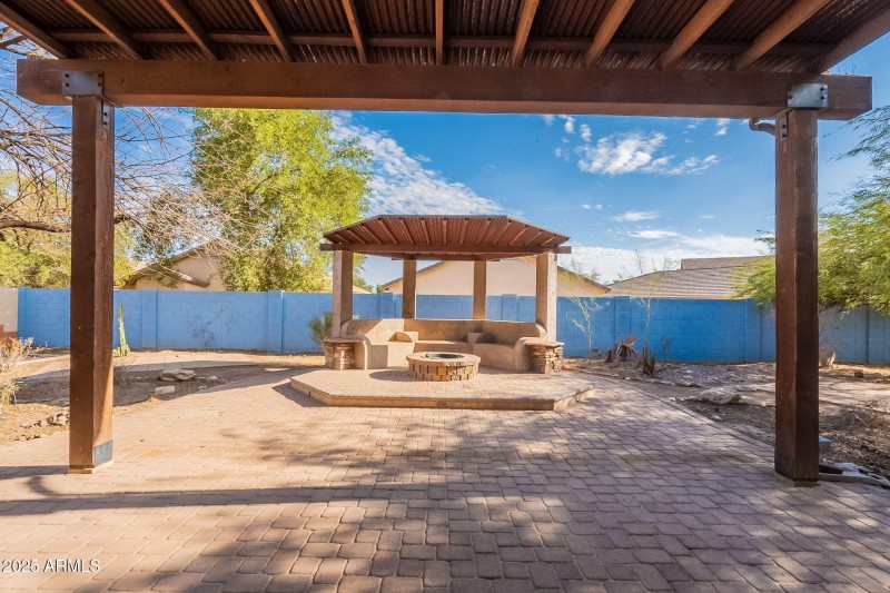 Backyard Gazebo with Firepit & Seating