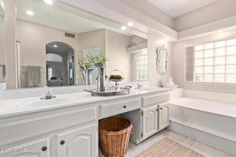Double vanities, soaking tub