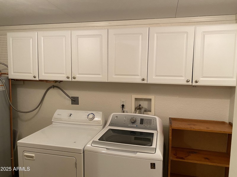 Full Laundry with Built In Cabinets