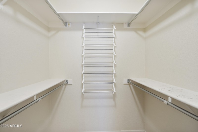 Primary Bedroom walk-in closet
