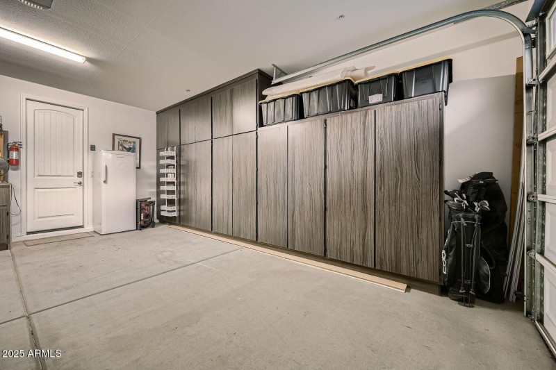 2 Car Garage with Storage Cabinets
