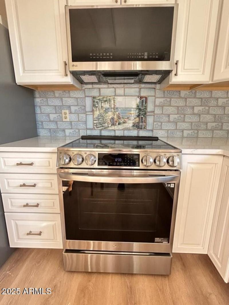 Stainless Steel Stove and Microwave