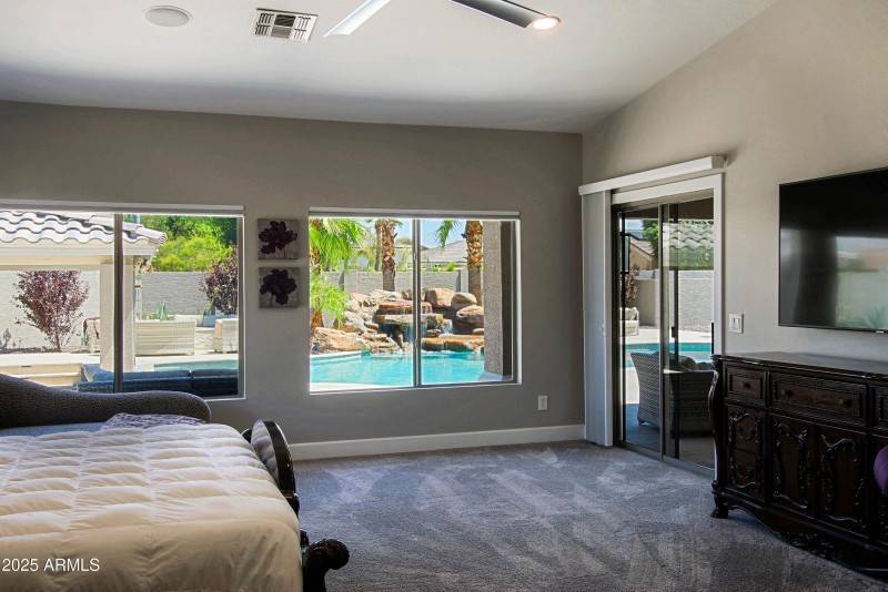 Primary Bedroom overlooking pool