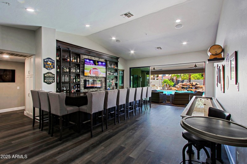 Custom Bar Opens to Outdoor Entertaining