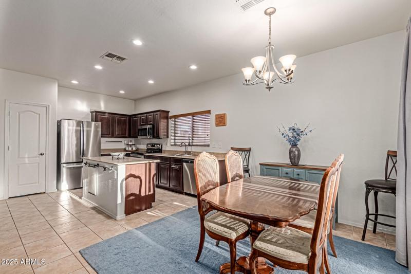 kitchen and dining with pool views