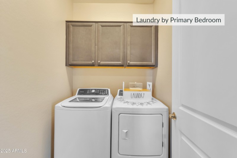 Laundry Room Next to Primary Suite