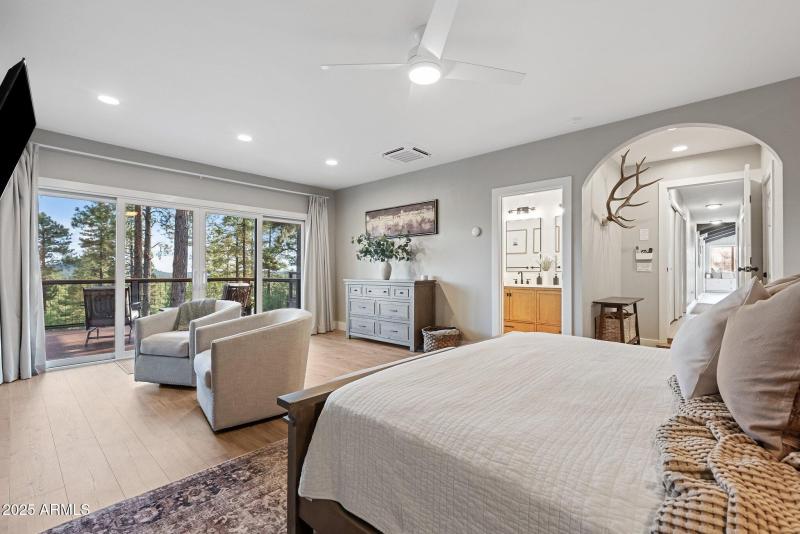 Primary Bedroom with beautiful archways