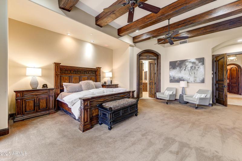 Luxurious Bedroom with Beamed Ceiling