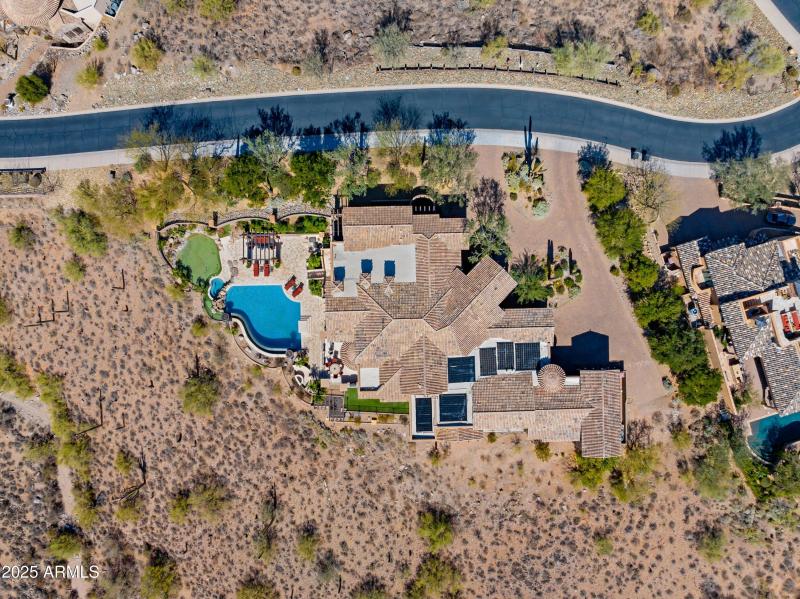 005_Aerial View of home and lot behi