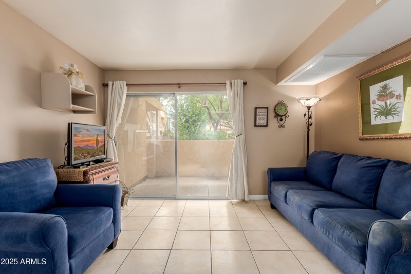Living room facing oversized patio
