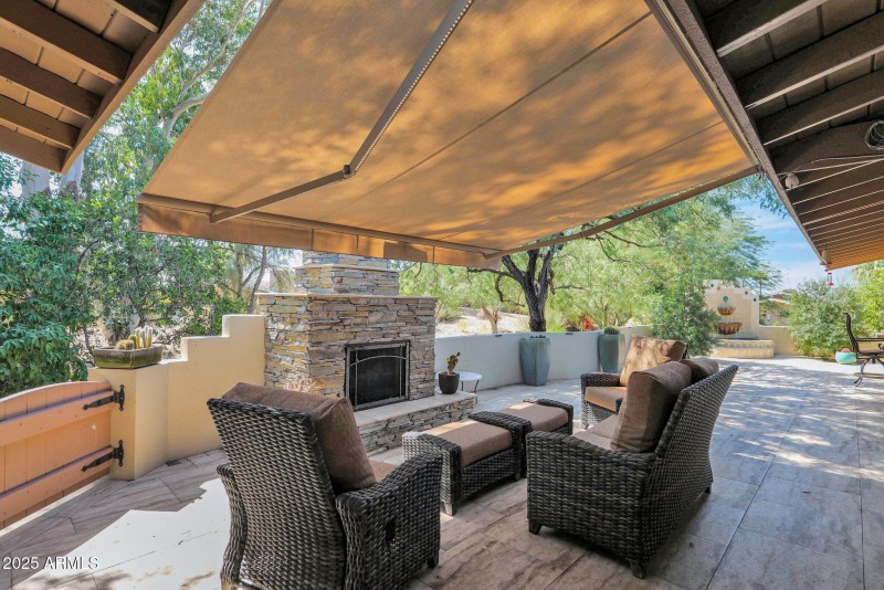Back Patio Fireplace with Awning