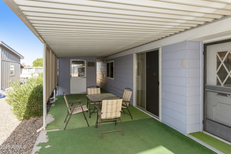 Covered patio W/ 2 Storage units