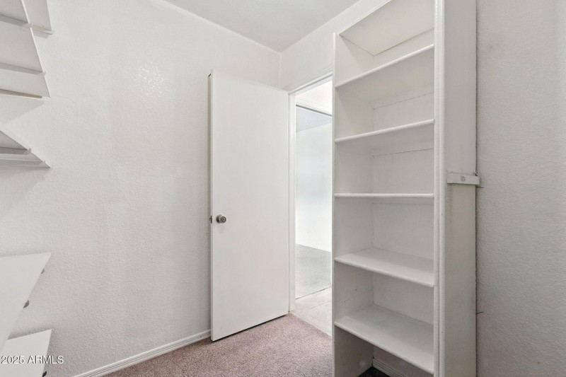Primary walk-in closet